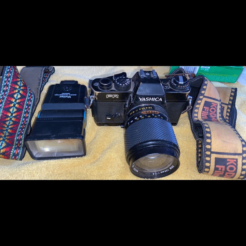 2 35mm cameras both work/ tons of extras